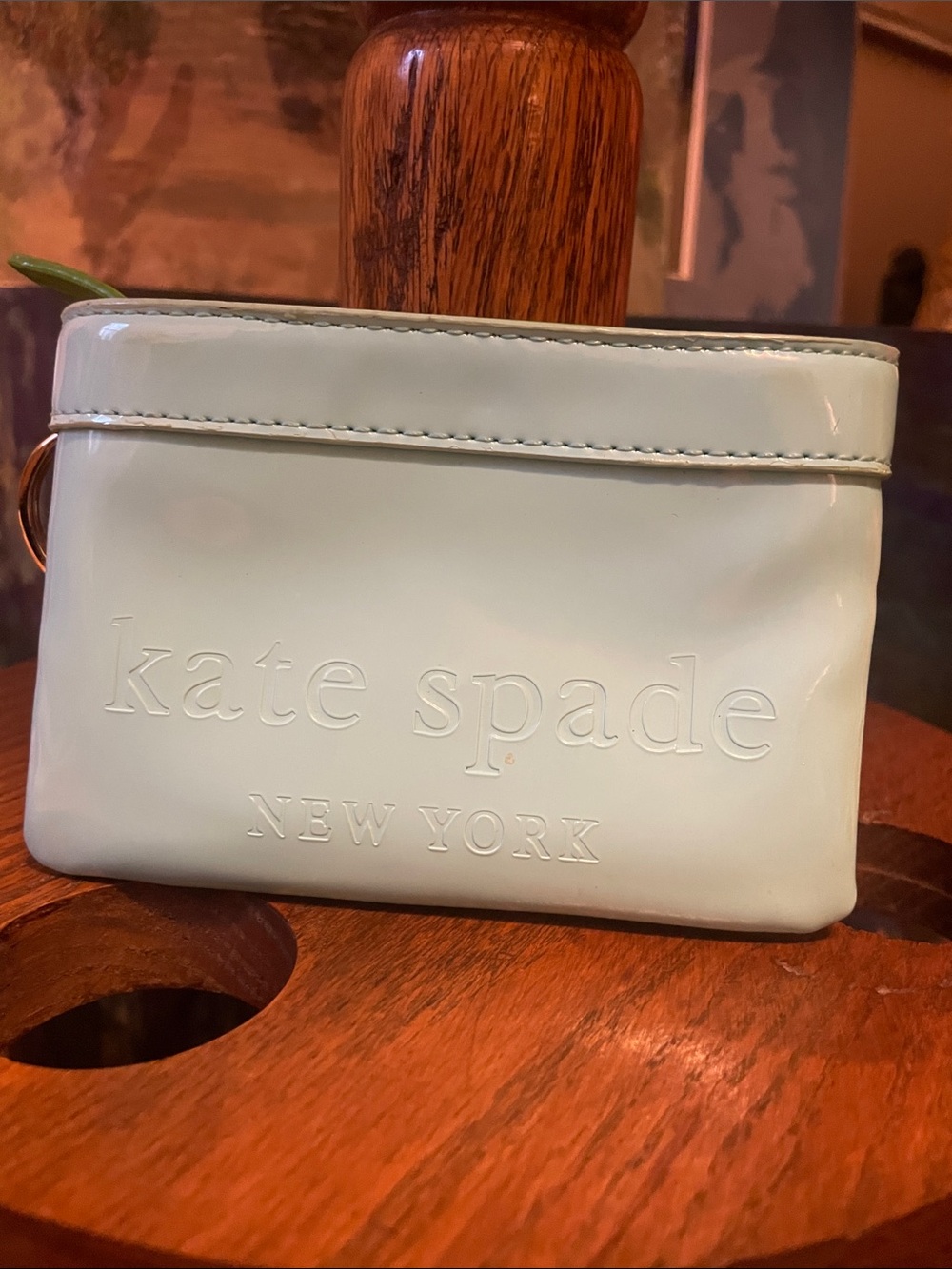 kate spade Light Blue Patent Mini Pouch with Embossed Logo
